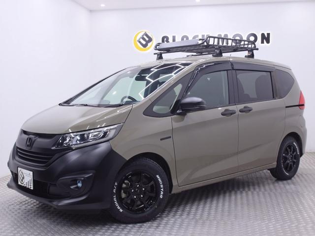 フリードハイブリッド ハイブリッド・EX オリジナルアウトドアカスタム ホンダセンシング ハーフレザー 新品ホイール/タイヤ/ルーフキャリア・ラック 両側電動スライドドア 純正メモリーナビ バックカメラ フリップダウンモニター シートヒーター(11枚目)