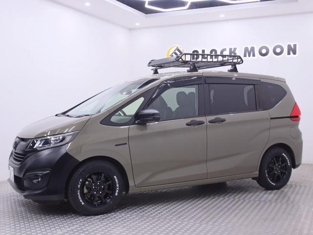 フリードハイブリッド ハイブリッド・EX オリジナルアウトドアカスタム ホンダセンシング ハーフレザー 新品ホイール/タイヤ/ルーフキャリア・ラック 両側電動スライドドア 純正メモリーナビ バックカメラ フリップダウンモニター シートヒーター(12枚目)