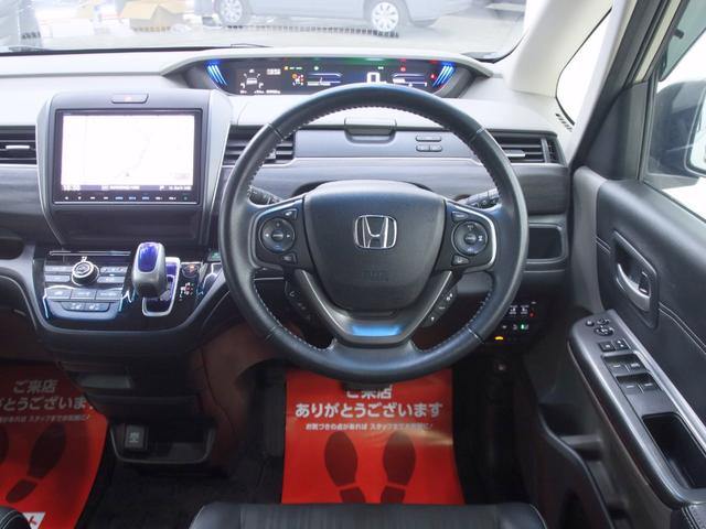 フリードハイブリッド ハイブリッド・EX オリジナルアウトドアカスタム ホンダセンシング ハーフレザー 新品ホイール/タイヤ/ルーフキャリア・ラック 両側電動スライドドア 純正メモリーナビ バックカメラ フリップダウンモニター シートヒーター(14枚目)