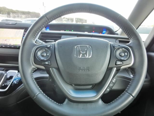 フリード+ハイブリッド ハイブリッド・クロスター 衝突軽減 VSA Rカメラ 地デジ 盗難防止装置 スマ-トキ- サイドエアバッグ LEDヘッド エアバッグ クルーズコントロール パワーステアリング 両席エアバック シ-トヒ-タ- クルコン ETC(28枚目)