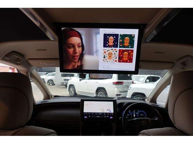 アルファードハイブリッド エグゼクティブラウンジ　リアシートエンターテイメント＆ＪＢＬサウンド　トヨタチームメイト　ベージュ革　ＯＰＤＶＤデッキ　ＯＰユニバーサルステップ　ＯＰ寒冷地仕様＆バックフォグランプ　ＯＰ１９ＡＷ　ＯＰガーニッシュ（25枚目）