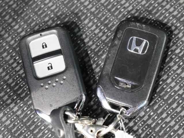フィット 13G・Lパッケージ 禁煙車 スマートキー LEDヘッドライト LEDドアミラーウインカー 純正ナビ バックカメラ Bluetooth接続 ワンセグ ホンダスマートキー ETC VSA 盗難警報装置 1オ-ナ- Bカメ(18枚目)
