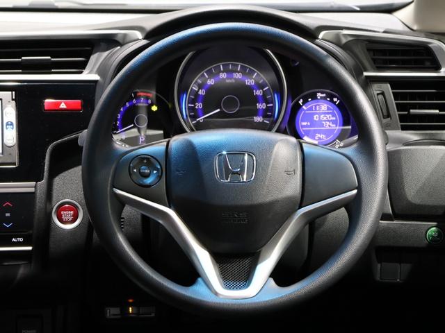 フィット 13G・Lパッケージ 禁煙車 スマートキー LEDヘッドライト LEDドアミラーウインカー 純正ナビ バックカメラ Bluetooth接続 ワンセグ ホンダスマートキー ETC VSA 盗難警報装置 1オ-ナ- Bカメ(27枚目)