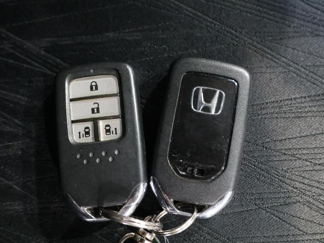 オデッセイ アブソルート　運転支援機能　衝突軽減ブレーキ　ＬＥＤヘッドライト　両側電動スライドドア　ＥＴＣ　　クルーズコントロール　社外ドラレコ　純正８インチナビ　バックカメラ　Ｂｌｕｅｔｏｏｔｈ接続　緊急ブレーキ　盗難防止（19枚目）