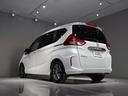 Ｇ・ホンダセンシング　禁煙車　運転支援機能　衝突軽減ブレーキ　両側電動スライドドア　ＬＥＤヘッドライト　純正９インチナビ　バックカメラ　Ｂｌｕｅｔｏｏｔｈ接続　ＥＴＣ　シートヒーター　スマートキー　Ｆセグ　ｉストップ（69枚目）