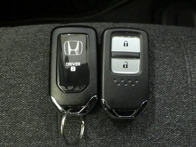 フィット e:HEVホーム 元当社試乗車 ブルートゥース 禁煙車 バックカメラ ドライブレコーダー ETC スマートキー LEDヘッドライト フルセグ 助手席エアバッグ 運転席エアバッグ 1オナ アイドリングストップ ABS(31枚目)