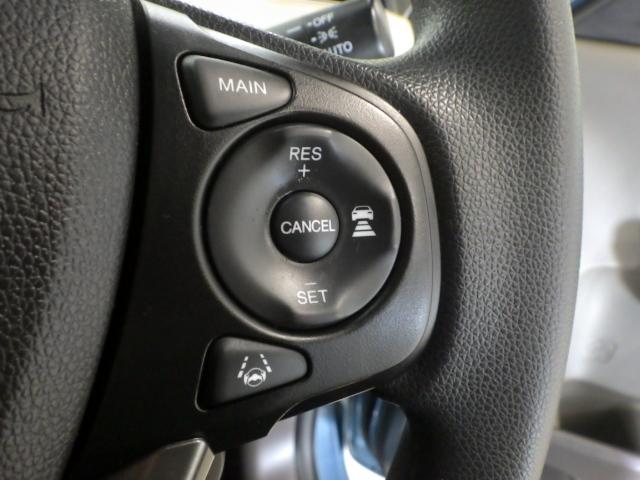 フリードハイブリッド ハイブリッド・Gホンダセンシング 禁煙車 9inナビ Rカメラ 社外アルミ 両側パワスラ LED クルコン VSA 軽減ブレーキ キーフリーシステム 記録簿 DVD再生可能 ECON 後カメラ Aクルーズ 地デジフルセグTV 横滑防止(11枚目)