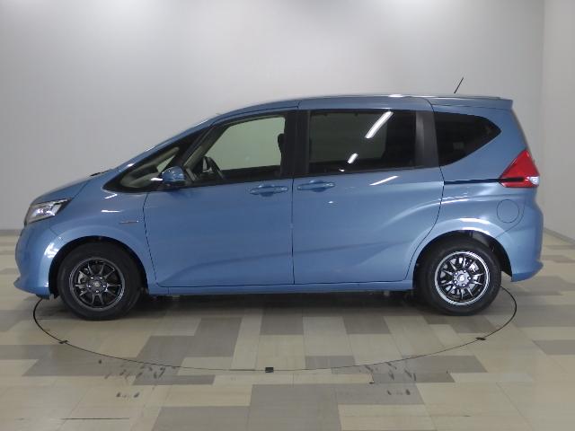 フリードハイブリッド ハイブリッド・Gホンダセンシング 禁煙車 9inナビ Rカメラ 社外アルミ 両側パワスラ LED クルコン VSA 軽減ブレーキ キーフリーシステム 記録簿 DVD再生可能 ECON 後カメラ Aクルーズ 地デジフルセグTV 横滑防止(21枚目)