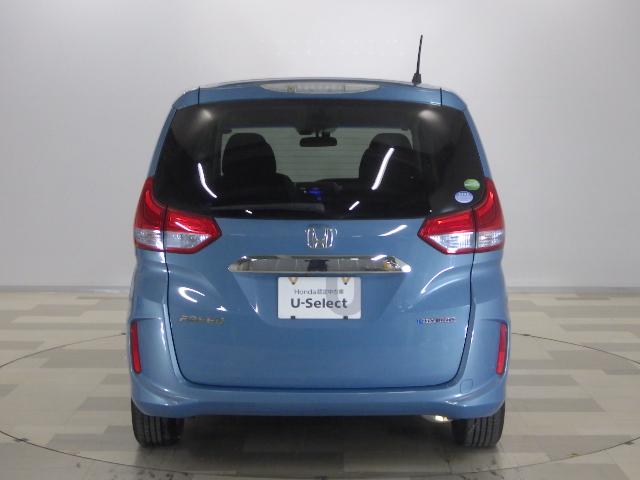 フリードハイブリッド ハイブリッド・Gホンダセンシング 禁煙車 9inナビ Rカメラ 社外アルミ 両側パワスラ LED クルコン VSA 軽減ブレーキ キーフリーシステム 記録簿 DVD再生可能 ECON 後カメラ Aクルーズ 地デジフルセグTV 横滑防止(23枚目)