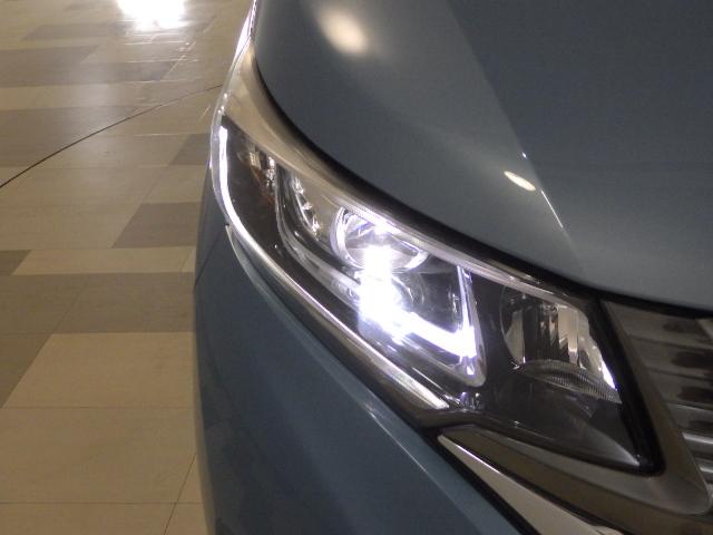 フリードハイブリッド ハイブリッド・Gホンダセンシング 禁煙車 9inナビ Rカメラ 社外アルミ 両側パワスラ LED クルコン VSA 軽減ブレーキ キーフリーシステム 記録簿 DVD再生可能 ECON 後カメラ Aクルーズ 地デジフルセグTV 横滑防止(28枚目)