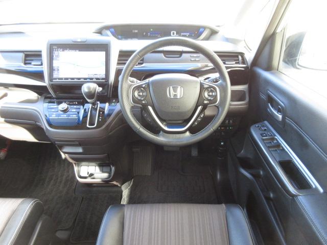 フリード モデューロＸホンダセンシング　禁煙車　９ｉｎナビ　Ｒカメラ　１５ＡＷ　専用エアロ　両側パワスラ　ドラレコ　ＬＥＤ　クルコン　１オーナー　１オナ　後カメラ　イモビ　オートクルーズ　記録簿　スマキー　ＤＶＤ再生　サイドエアバッグ　ＰＳ（9枚目）