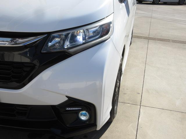 フリード モデューロＸホンダセンシング　禁煙車　９ｉｎナビ　Ｒカメラ　１５ＡＷ　専用エアロ　両側パワスラ　ドラレコ　ＬＥＤ　クルコン　１オーナー　１オナ　後カメラ　イモビ　オートクルーズ　記録簿　スマキー　ＤＶＤ再生　サイドエアバッグ　ＰＳ（25枚目）