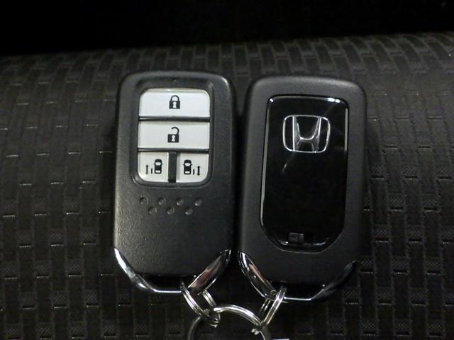 ステップワゴンスパーダ スパーダホンダセンシング 禁煙車 9inナビ Rカメラ 16AW 1オーナー 両側パワスラ クルコン LED VSA 盗難防止 助手席エアバッグ ワンオーナ- Wパワスラ 記録簿有 地デジ 横滑り防止システム オートエアコン(27枚目)