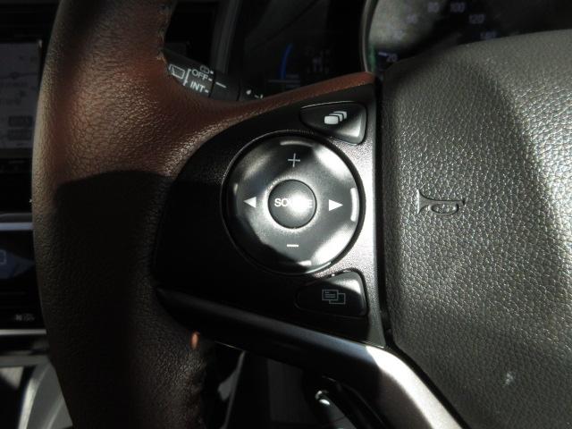 フィットハイブリッド Ｌホンダセンシング　ホンダセンシング　６エアバック　ＬＥＤ　スマートキー　ドアバイザー　ワンオーナー　禁煙車　ナビ　Ｒカメラ　フルセグ　ブルートゥース　サウンドコンテナー　フルセグ　ＥＴＣ　ＤＶＤ　ＣＤ　ドアバイザー（9枚目）