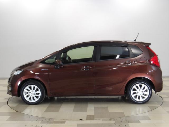 フィットハイブリッド Ｌホンダセンシング　ホンダセンシング　６エアバック　ＬＥＤ　スマートキー　ドアバイザー　ワンオーナー　禁煙車　ナビ　Ｒカメラ　フルセグ　ブルートゥース　サウンドコンテナー　フルセグ　ＥＴＣ　ＤＶＤ　ＣＤ　ドアバイザー（20枚目）