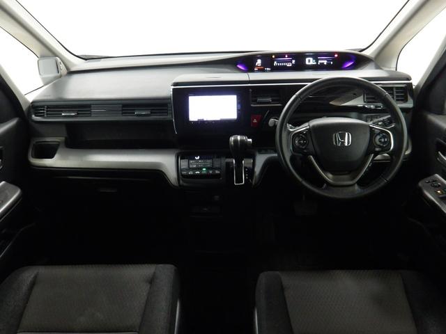 ステップワゴンスパーダ スパーダホンダセンシング　禁煙車ナビ　Ｒカメラ　ＤＶＤ　ＣＤ　ブルートゥース　ミージュックラック　リア席モニター　両席電動スライドドア　ドアバイザー　ＬＥＤ　ＥＴＣ　スマートキー　ＬＥＤ　ワンオーナー　社外アルミ　盗難防止（13枚目）