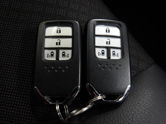 フリードハイブリッド ハイブリッド・Gホンダセンシング ナビ Rカメラ ミュージックラック DVD CD ブルートゥース フルセグ ホンダセンシング 両側電動スライドドア LED ETCスマートキー 軽減ブレーキ キーフリーシステム 1オ-ナ- ECON(9枚目)