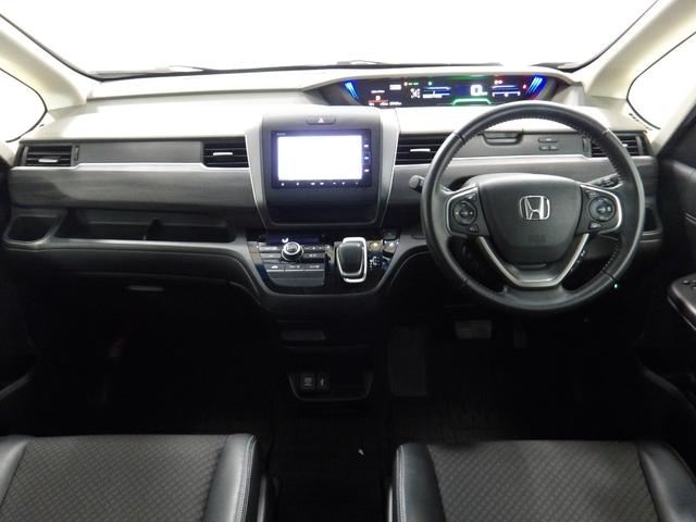 フリードハイブリッド ハイブリッド・Gホンダセンシング ナビ Rカメラ ミュージックラック DVD CD ブルートゥース フルセグ ホンダセンシング 両側電動スライドドア LED ETCスマートキー 軽減ブレーキ キーフリーシステム 1オ-ナ- ECON(13枚目)