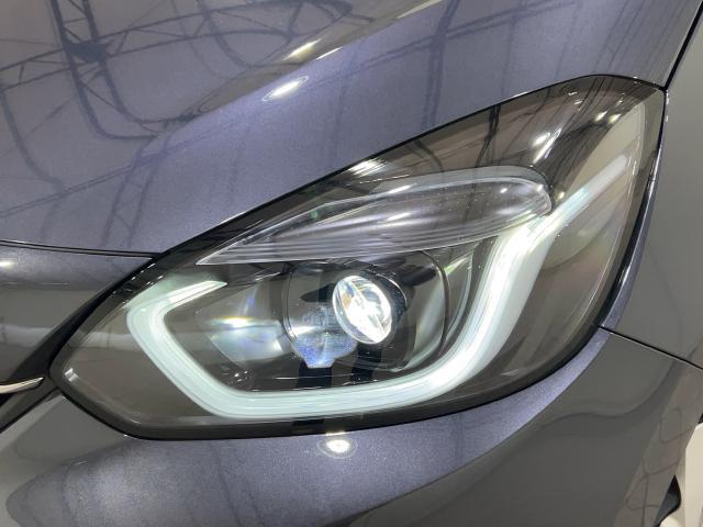 フィット ｅ：ＨＥＶホーム　前後誤発進抑制機能　マルチビュー　助手席エアバッグ　運転席エアバッグ　１オナ　アイドリングストップ　禁煙　ＬＥＤライト　ＡＢＳ　サイドエアバッグ　フルセグＴＶ　スマートキー　記録簿（6枚目）