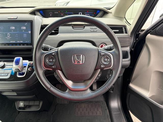 フリードハイブリッド ハイブリッド・EX 地デジフルセグTV シ-トヒ-タ- 整備記録簿 USB接続 リヤカメラ LEDライト フルオートエアコン ABS ドラレコ付 DVD再生可 ウォークスルー サイドエアバッグ(7枚目)