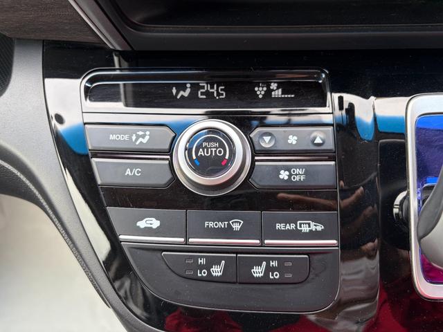 フリードハイブリッド ハイブリッド・EX 地デジフルセグTV シ-トヒ-タ- 整備記録簿 USB接続 リヤカメラ LEDライト フルオートエアコン ABS ドラレコ付 DVD再生可 ウォークスルー サイドエアバッグ(14枚目)