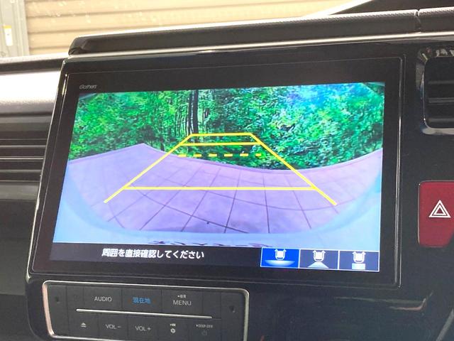 ステップワゴンスパーダ ｅ：ＨＥＶスパーダ　Ｇ　ホンダセンシング　純正１０型ナビ　バックカメラ　両側電動スライドドア　衝突軽減　レーダークルーズコントロール　ＥＴＣ　禁煙車　ＬＥＤヘッドライト＆フォグライト　オートライト　オートエアコン　革巻きステアリング（4枚目）