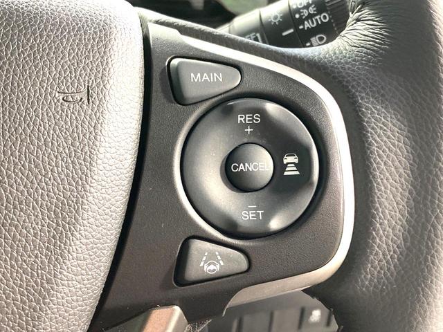 ステップワゴンスパーダ ｅ：ＨＥＶスパーダ　Ｇ　ホンダセンシング　純正１０型ナビ　バックカメラ　両側電動スライドドア　衝突軽減　レーダークルーズコントロール　ＥＴＣ　禁煙車　ＬＥＤヘッドライト＆フォグライト　オートライト　オートエアコン　革巻きステアリング（7枚目）