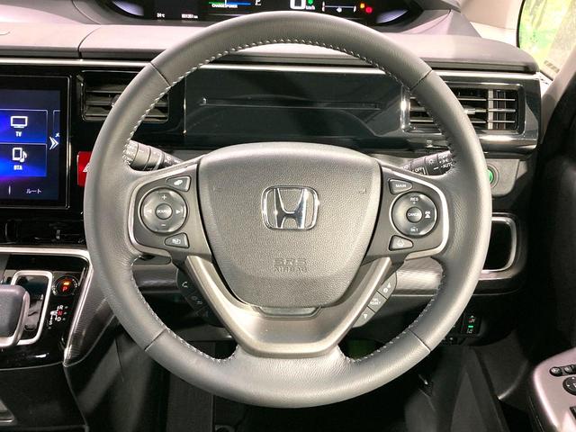 ステップワゴンスパーダ ｅ：ＨＥＶスパーダ　Ｇ　ホンダセンシング　純正１０型ナビ　バックカメラ　両側電動スライドドア　衝突軽減　レーダークルーズコントロール　ＥＴＣ　禁煙車　ＬＥＤヘッドライト＆フォグライト　オートライト　オートエアコン　革巻きステアリング（12枚目）