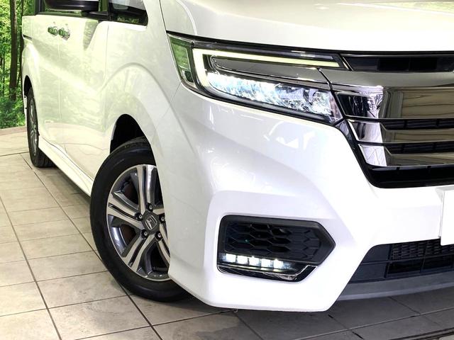 ステップワゴンスパーダ ｅ：ＨＥＶスパーダ　Ｇ　ホンダセンシング　純正１０型ナビ　バックカメラ　両側電動スライドドア　衝突軽減　レーダークルーズコントロール　ＥＴＣ　禁煙車　ＬＥＤヘッドライト＆フォグライト　オートライト　オートエアコン　革巻きステアリング（13枚目）