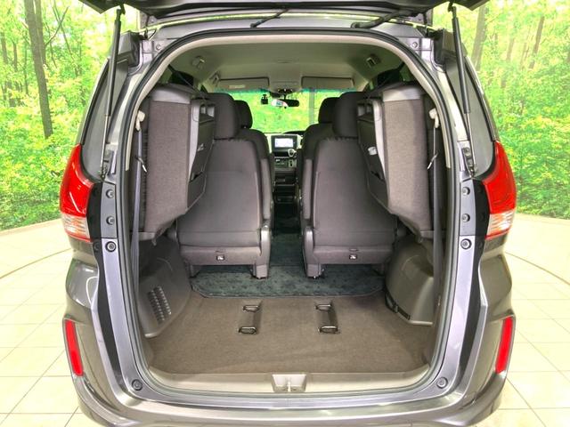 フリード G・ホンダセンシング 禁煙車 純正SDナビ 両側電動ドア 衝突軽減 アダプティブクルーズコントロール 車線逸脱警告 オートエアコン 横滑り防止 プライバシーガラス ETC バックカメラ スマートキー(10枚目)