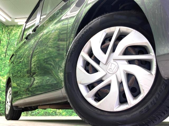 フリード G・ホンダセンシング 禁煙車 純正SDナビ 両側電動ドア 衝突軽減 アダプティブクルーズコントロール 車線逸脱警告 オートエアコン 横滑り防止 プライバシーガラス ETC バックカメラ スマートキー(12枚目)