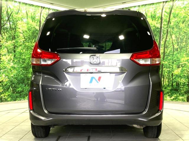 フリード G・ホンダセンシング 禁煙車 純正SDナビ 両側電動ドア 衝突軽減 アダプティブクルーズコントロール 車線逸脱警告 オートエアコン 横滑り防止 プライバシーガラス ETC バックカメラ スマートキー(15枚目)