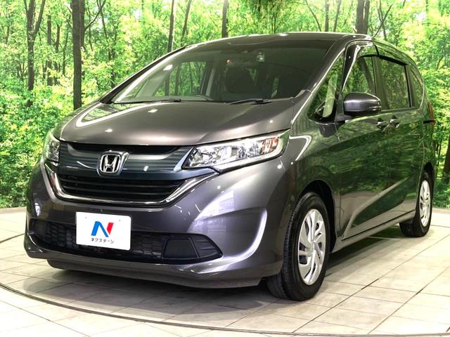 フリード G・ホンダセンシング 禁煙車 純正SDナビ 両側電動ドア 衝突軽減 アダプティブクルーズコントロール 車線逸脱警告 オートエアコン 横滑り防止 プライバシーガラス ETC バックカメラ スマートキー(21枚目)