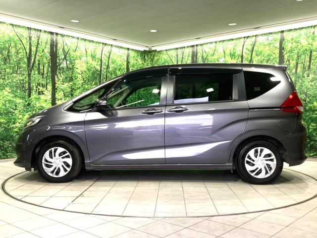 フリード G・ホンダセンシング 禁煙車 純正SDナビ 両側電動ドア 衝突軽減 アダプティブクルーズコントロール 車線逸脱警告 オートエアコン 横滑り防止 プライバシーガラス ETC バックカメラ スマートキー(24枚目)