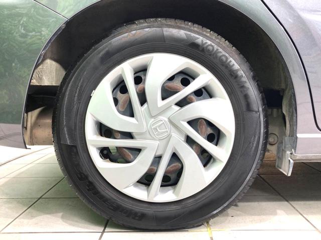 フリード G・ホンダセンシング 禁煙車 純正SDナビ 両側電動ドア 衝突軽減 アダプティブクルーズコントロール 車線逸脱警告 オートエアコン 横滑り防止 プライバシーガラス ETC バックカメラ スマートキー(25枚目)