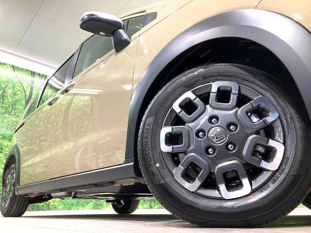 フリード e:HEVクロスター 登録済未使用車 両側電動ドア 衝突被害軽減システム レーダークルーズ ハーフレザーシート コーナーセンサー スマートキー LEDヘッド ルーフレール オートハイビーム 車線逸脱警報 オートライト(14枚目)