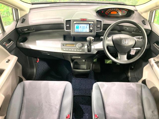 フリード G ジャストセレクション 電動スライドドア 純正SDナビ 禁煙車 HIDヘッド ETC オートライト オートエアコン 電動格納ドアミラー ドアバイザー プライバシーガラス(2枚目)