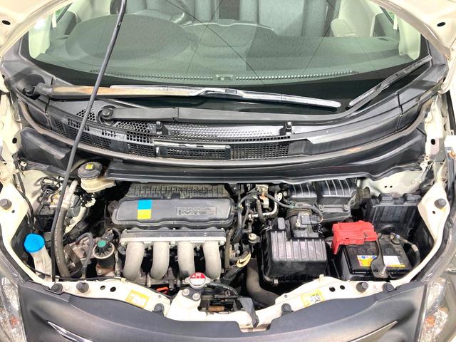 フリード G ジャストセレクション 電動スライドドア 純正SDナビ 禁煙車 HIDヘッド ETC オートライト オートエアコン 電動格納ドアミラー ドアバイザー プライバシーガラス(18枚目)