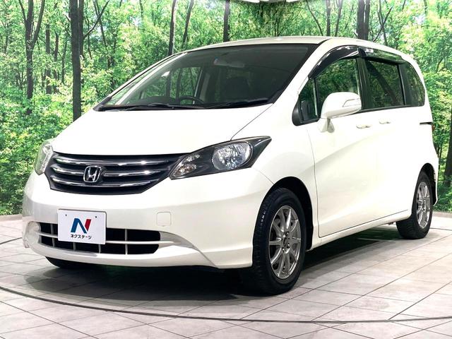 フリード G ジャストセレクション 電動スライドドア 純正SDナビ 禁煙車 HIDヘッド ETC オートライト オートエアコン 電動格納ドアミラー ドアバイザー プライバシーガラス(28枚目)