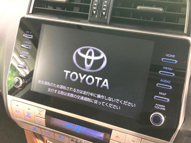 ランドクルーザープラド TX Lパッケージ 70thアニバーサリーリミテッド 禁煙車 7人乗り サンルーフ メーカー9型ナビ 全周囲カメラ セーフティセンス 茶皮シート シートベンチレーション LEDヘッドライト ETC ブラインドスポットモニター オートマチックハイビーム(4枚目)