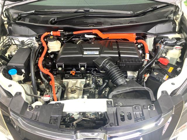 オデッセイハイブリッド ハイブリッドアブソルート・ホンダセンシング 禁煙車 メーカーナビ 両側電動ドア 衝突被害軽減システム 後席モニター 全周囲カメラ 100V電源 レーダークルーズ ハーフレザーシート パワーシート ドラレコ コーナーセンサー LEDヘッド(20枚目)