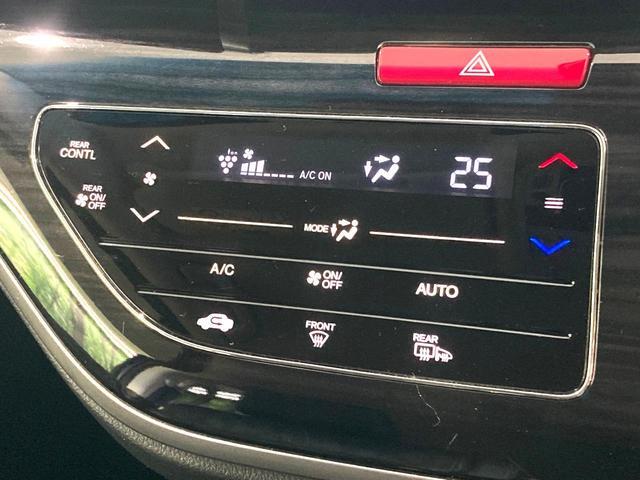 オデッセイハイブリッド ハイブリッドアブソルート・ホンダセンシング 禁煙車 メーカーナビ 両側電動ドア 衝突被害軽減システム 後席モニター 全周囲カメラ 100V電源 レーダークルーズ ハーフレザーシート パワーシート ドラレコ コーナーセンサー LEDヘッド(55枚目)