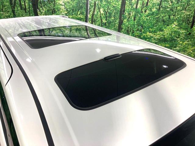 ヴォクシー ZS サンルーフ 両側電動ドア 純正9型ナビ 後席モニター バックカメラ 寒冷地仕様 禁煙車 スマートキー LEDヘッド ビルトインETC 純正16インチアルミ オートライト デュアルエアコン(3枚目)