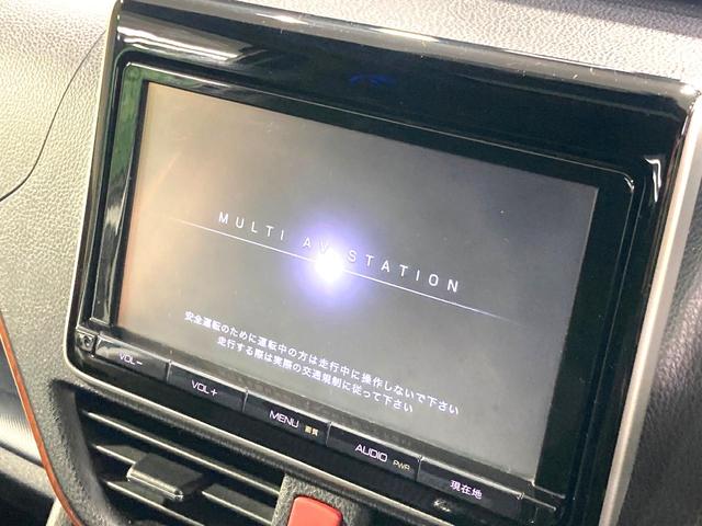 ヴォクシー ZS サンルーフ 両側電動ドア 純正9型ナビ 後席モニター バックカメラ 寒冷地仕様 禁煙車 スマートキー LEDヘッド ビルトインETC 純正16インチアルミ オートライト デュアルエアコン(5枚目)