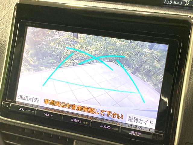 ヴォクシー ZS サンルーフ 両側電動ドア 純正9型ナビ 後席モニター バックカメラ 寒冷地仕様 禁煙車 スマートキー LEDヘッド ビルトインETC 純正16インチアルミ オートライト デュアルエアコン(6枚目)