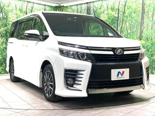 ヴォクシー ZS サンルーフ 両側電動ドア 純正9型ナビ 後席モニター バックカメラ 寒冷地仕様 禁煙車 スマートキー LEDヘッド ビルトインETC 純正16インチアルミ オートライト デュアルエアコン(16枚目)