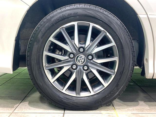 ヴォクシー ZS サンルーフ 両側電動ドア 純正9型ナビ 後席モニター バックカメラ 寒冷地仕様 禁煙車 スマートキー LEDヘッド ビルトインETC 純正16インチアルミ オートライト デュアルエアコン(25枚目)