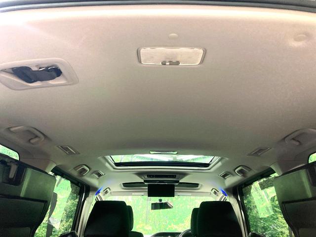 ヴォクシー ZS サンルーフ 両側電動ドア 純正9型ナビ 後席モニター バックカメラ 寒冷地仕様 禁煙車 スマートキー LEDヘッド ビルトインETC 純正16インチアルミ オートライト デュアルエアコン(37枚目)