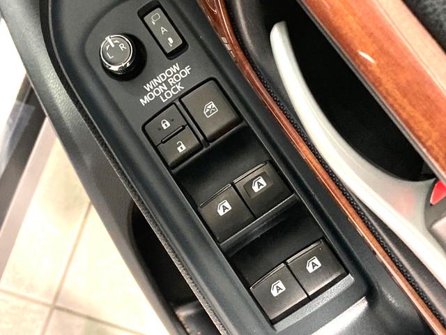 ヴォクシー ZS サンルーフ 両側電動ドア 純正9型ナビ 後席モニター バックカメラ 寒冷地仕様 禁煙車 スマートキー LEDヘッド ビルトインETC 純正16インチアルミ オートライト デュアルエアコン(45枚目)