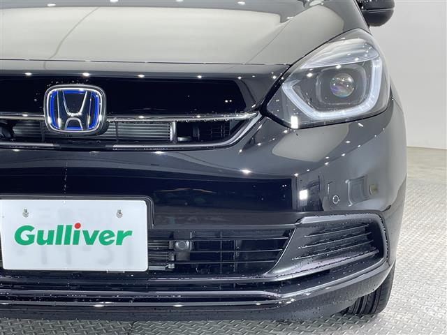 フィット e:HEVホーム SDナビ CD DVD Bluetooth USB フルセグTV バックカメラ 衝突軽減ブレーキ 前後コーナーセンサー ビルトインETC オートライト LEDヘッドライト 横滑り防止装置 スマートキー(37枚目)